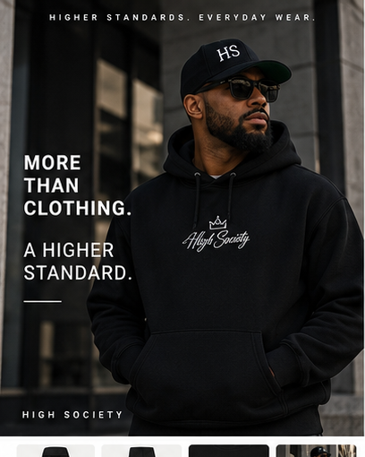 Male model wearing black High Society premium hoodie in an urban setting
